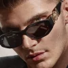 Une paire de lunettes de soleil PC pour hommes et femmes avec les nouvelles lunettes de soleil rétro de grande valeur, lunettes de soleil à la mode, célébrité en ligne avec œil de chat