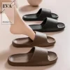 Mode femmes pantoufles plat léger EVA maison salle de bain pantoufles confort Massage Couple intérieur diapositives chaussures de douche femmes chaussures