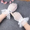 Gants courts en dentelle pour femmes, élégants, filet de poisson transparent, noir et blanc, gants de fête de bal, mitaines de couleur unie à la mode, tendance