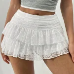 Jupe courte en dentelle blanche tendance pour femmes, style printemps-été, design français avec taille élastique, jupe courte