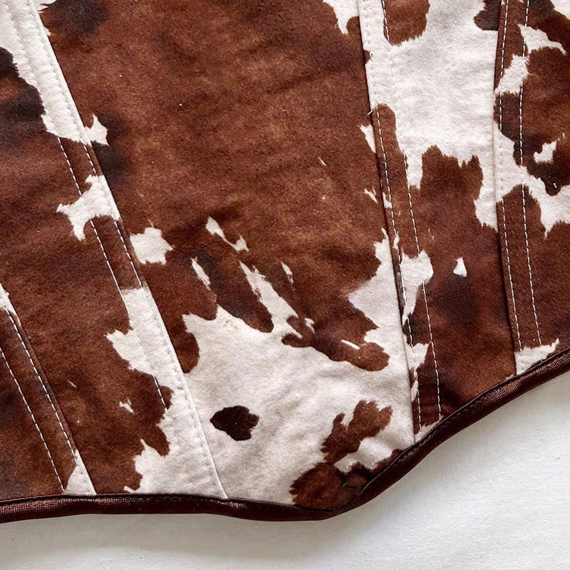 Haut corset à lacets imprimé vache pour femme, sans manches, en daim, style western, pour festival de musique, concert, tenue sexy de cowgirl, déguisement médiéval