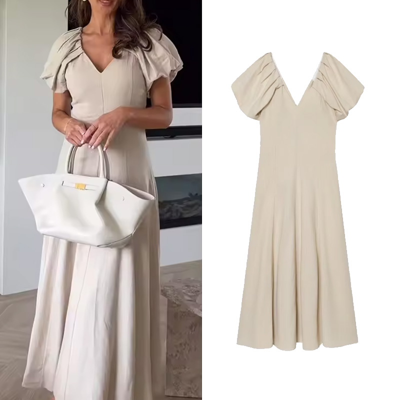Nouvelle Robe Midi Femme Printemps 2026 Décontractée Col V Manches Bouffantes Unie Longue Évasée Chic