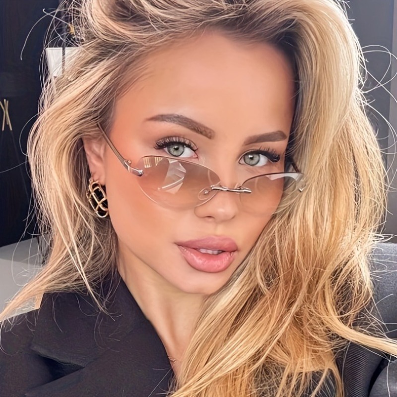 Lunettes de soleil sans monture pour femmes, verres ovales dégradés, style Y2K, futuristes, sexy, style Spice Girl, protection UV, lunettes de soleil tendance