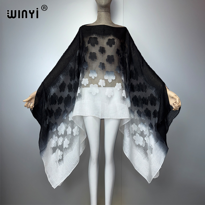 WINYI Robe d'été transparente et sexy pour femmes, tenue de plage, kaftan africain pour femme, robe de plage élégante et sexy pour les vacances.