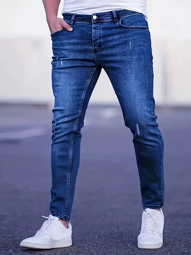 Jeans en denim stretch slim pour homme avec détails déchirés et surpiqûres contrastées, pantalon décontracté streetwear tendance pour le quotidien