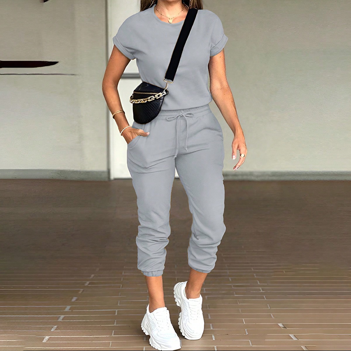 Ensemble deux pièces de sport pour femmes, mode d'été, confortable, décontracté, couleur unie, col rond, haut à manches courtes et pantalon élastique