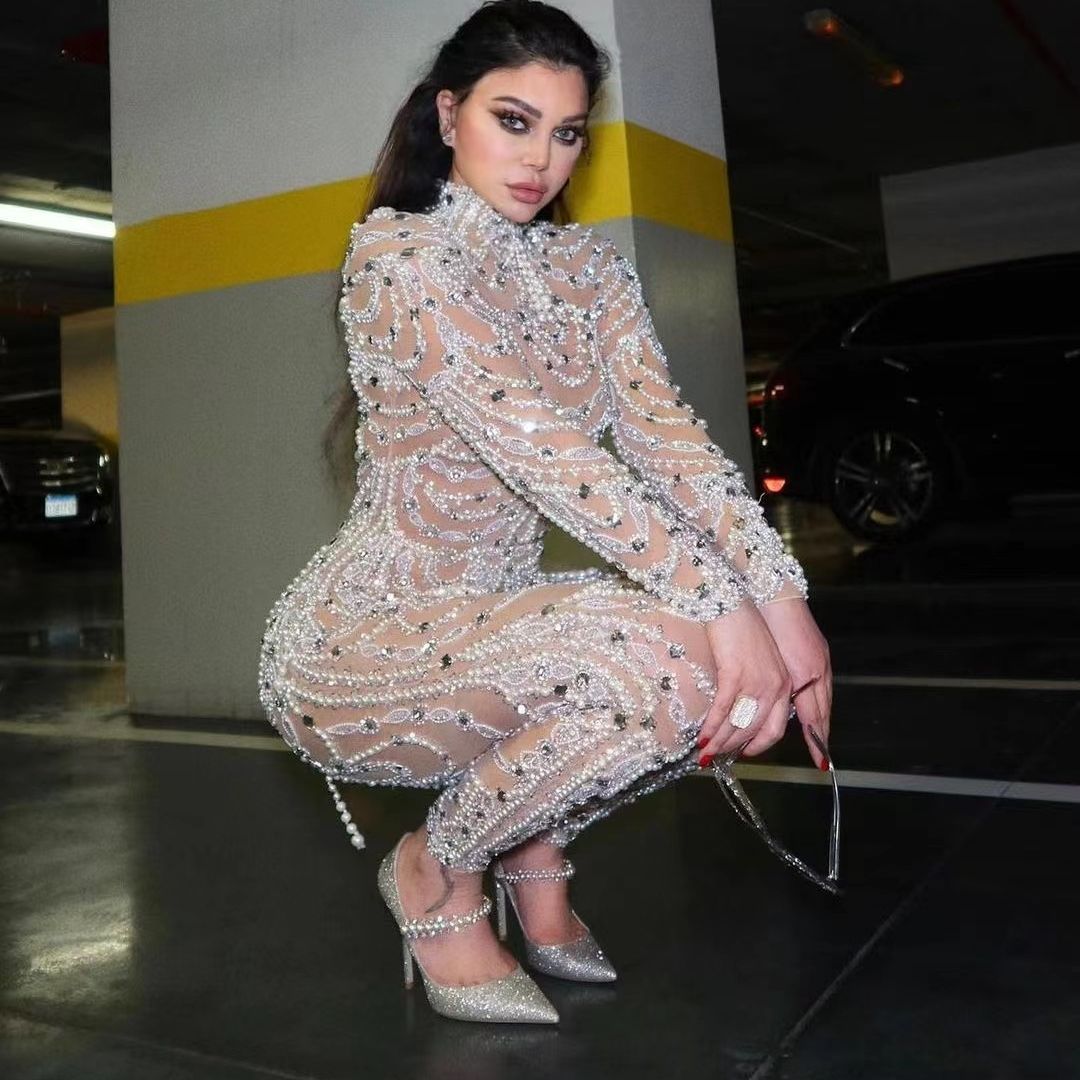 La nouvelle robe pour femmes européennes et américaines 2025 est amincissante et ajustée, avec des paillettes transparentes et un pantalon une pièce sexy