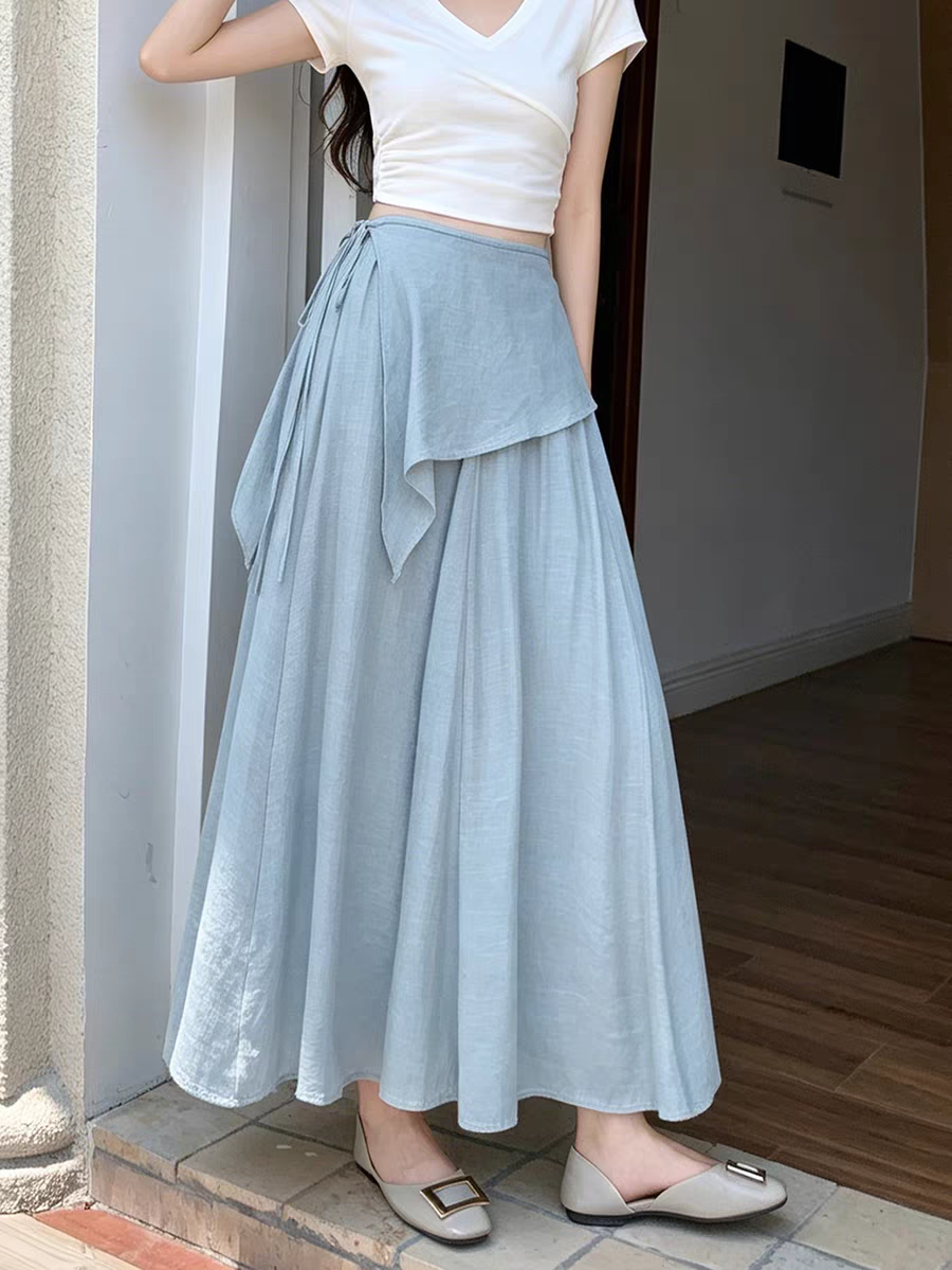 Nouvelle jupe longue évasée taille haute à nouer pour femme, style bohème fluide, collection été 2026, idéale pour couvrir les hanches