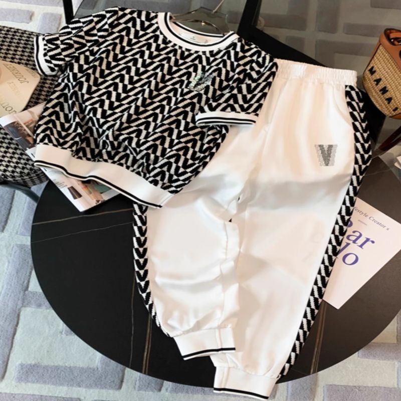 Costume à la mode pour femmes, nouvel article d'été, sensation haut de gamme, réduction de l'âge, manches courtes, pantalon décontracté noué aux jambes, ensemble deux pièces