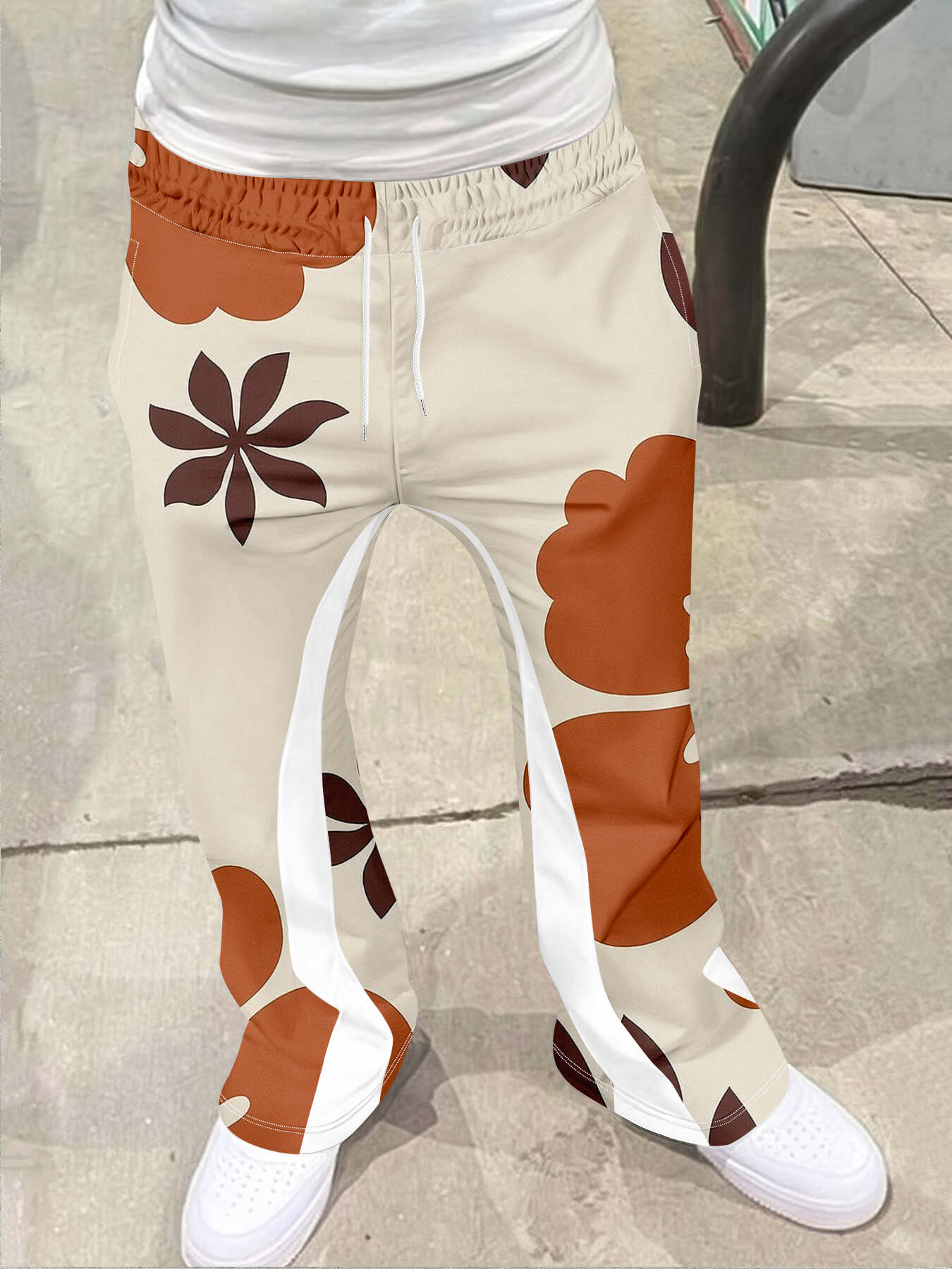Pantalon de survêtement pour hommes, Style de rue décontracté, tendance, imprimé croisé, à la mode, légèrement évasé, noir et blanc, Design bloc de couleurs