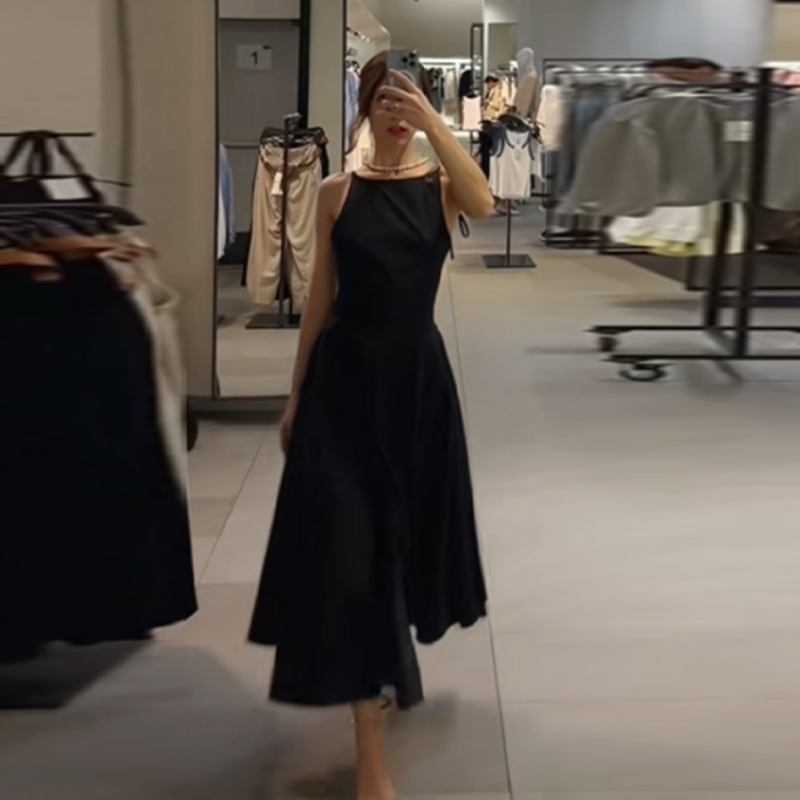 Robe midi noire chic et élégante sans manches coupe trapèze classique pour femme – Tenue intemporelle décontractée et tendance pour l'été et le bureau