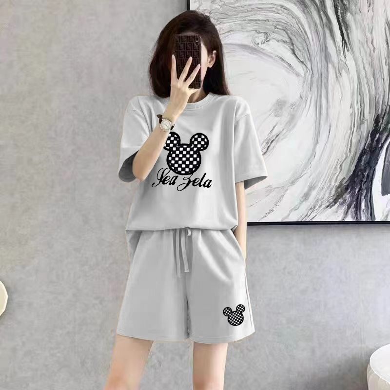 Mode apparaître mince été costume décontracté femmes simplicité bureau dame dessin animé couleur unie coréen à manches courtes Shorts deux pièces ensemble