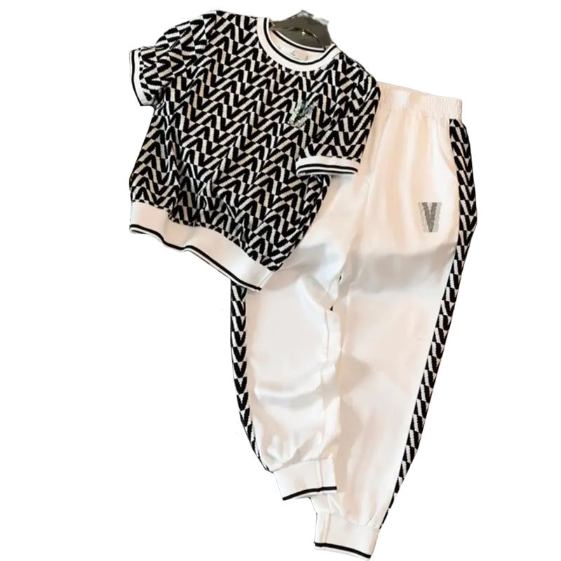 Costume à la mode pour femmes, nouvel article d'été, sensation haut de gamme, réduction de l'âge, manches courtes, pantalon décontracté noué aux jambes, ensemble deux pièces