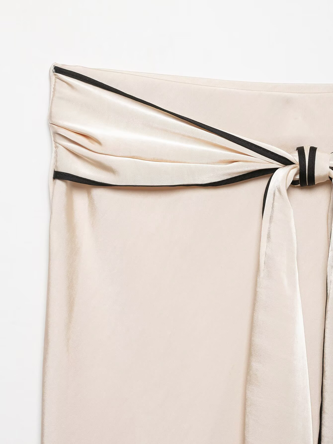 Nouvelle jupe MIDI pour femmes, style européen et américain, tendance 2026, polyvalente, avec décoration en nœud, en satin de soie.