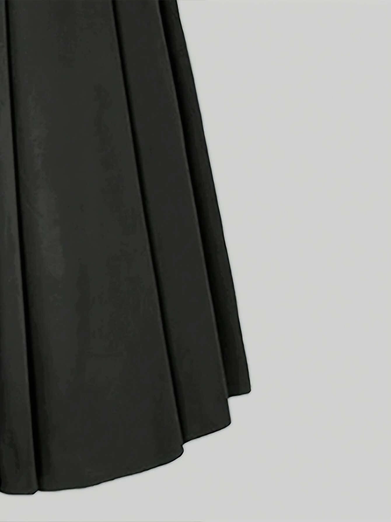 Jupe longue plissée élégante de couleur unie, style vintage, ourlet fluide et évasé, idéale pour les fêtes et le quotidien