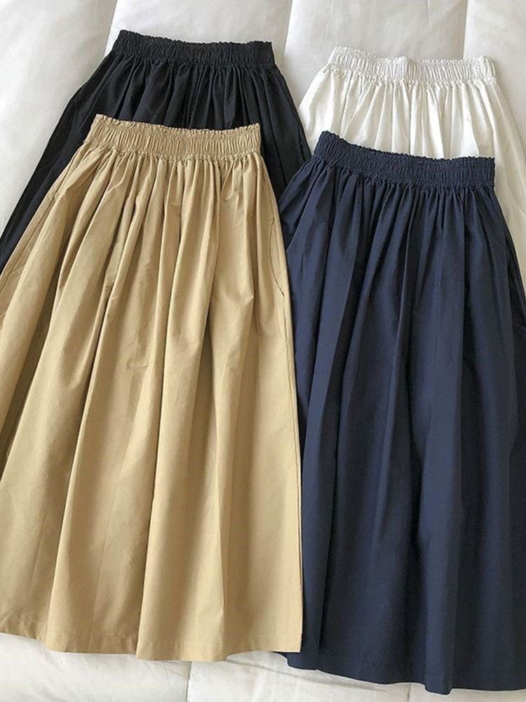 Jupe longue blanche pour femmes, taille haute, ligne a, longueur aux genoux, poches plissées, décontractées, élégantes, pour l'automne 2024