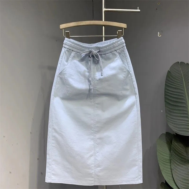Mode coréenne 2025 nouvelle jupe d'été femmes décontracté sauvage taille haute Simple mi-longue fendue a-ligne jupe mince dames vêtements