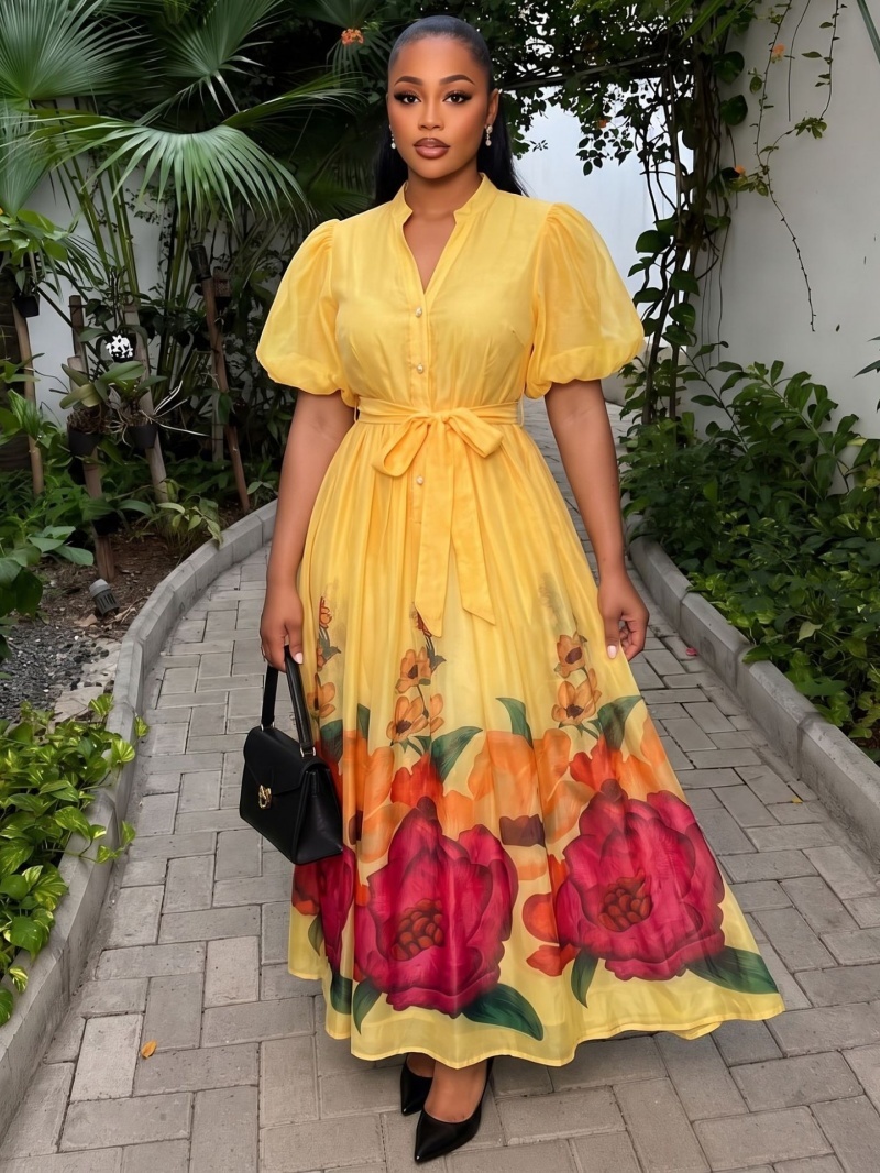 Robe longue maxi bohème à imprimé floral pour femme, collection été 2026, avec manches bouffantes et boutonnage simple, idéale pour les soirées et les vacances
