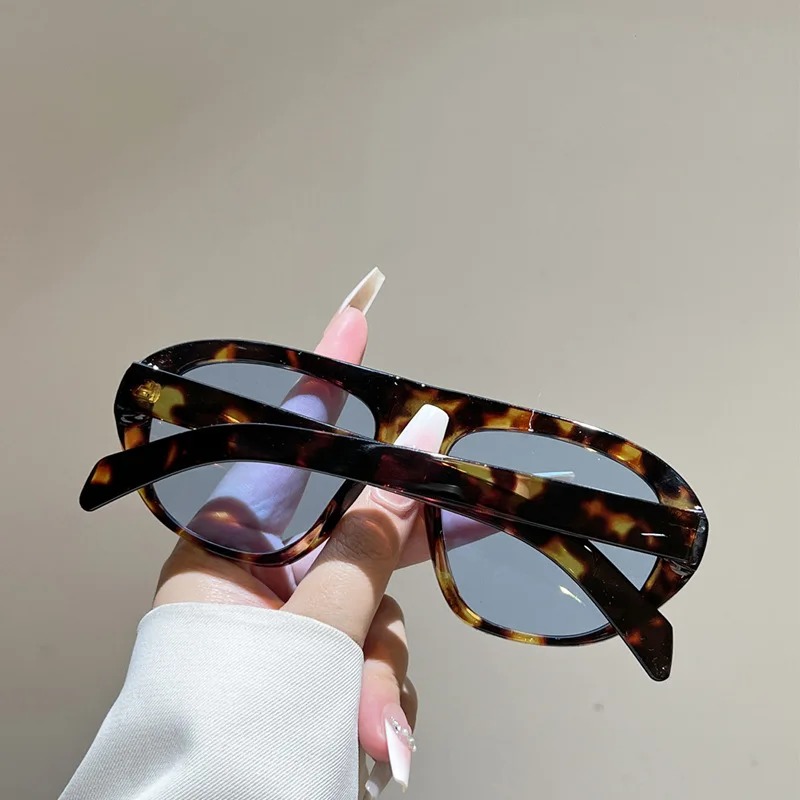 Nouvelles lunettes de soleil ovales à dégradé léopard pour femmes, lunettes de soleil vintage élégantes pour hommes, lunettes de soleil d'extérieur UV400, verres noirs