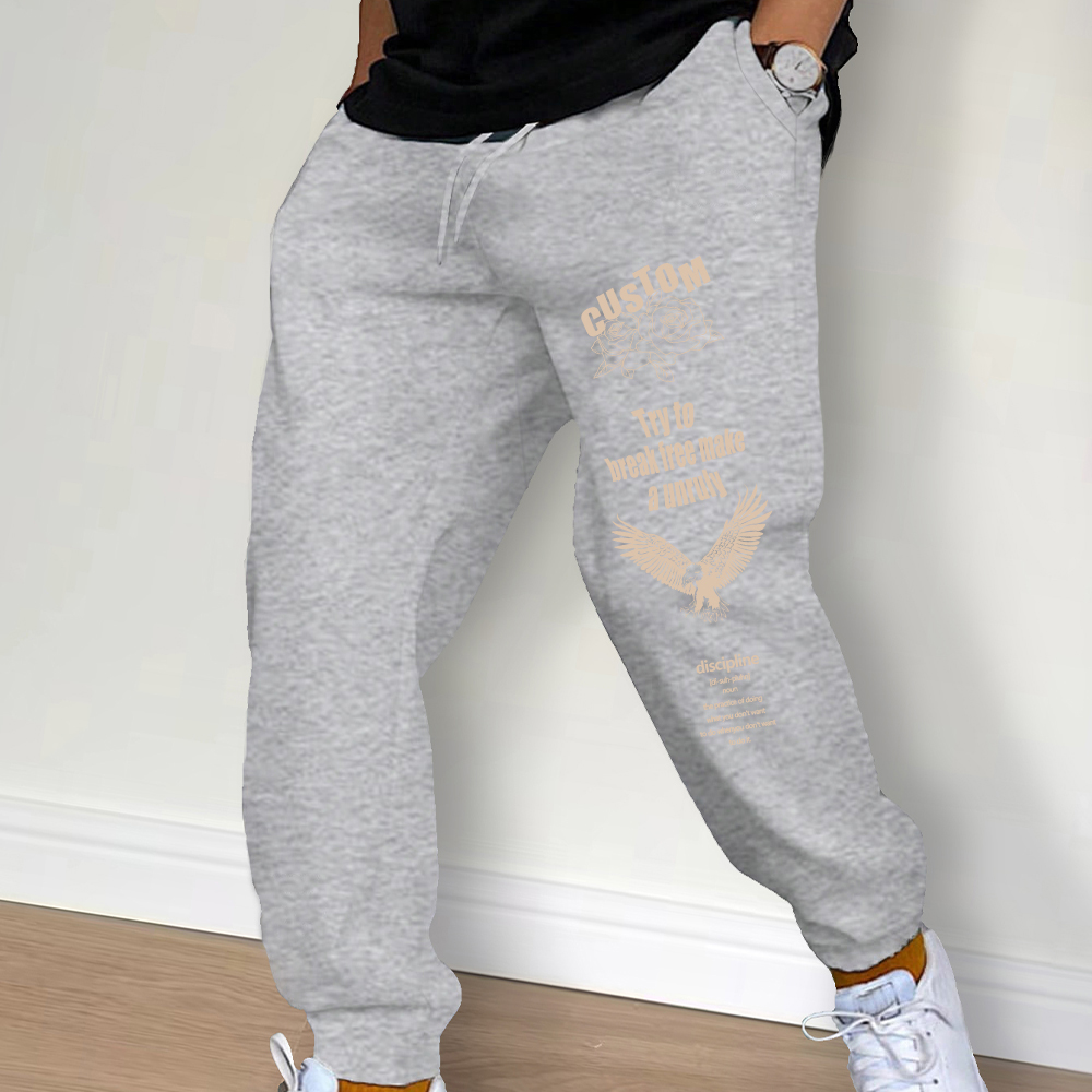 Hommes pantalons de survêtement printemps automne nouveau survêtement salle de sport sport Fitness imprimé pantalons décontractés taille moyenne cordon pantalon d'entraînement