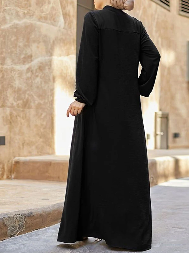 Robe noire musulmane avec petit col montant et poches zippées, élégante, ample et décontractée, à manches longues