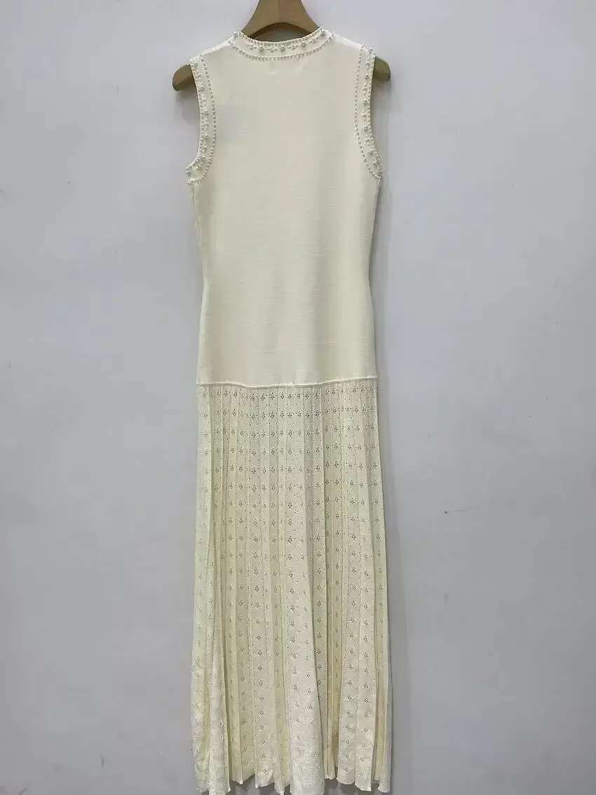 Perles décorées femmes col rond sans manches épissage tricoté robe pull élégant ou court tricoté 2025 printemps nouvelles femmes P8QA