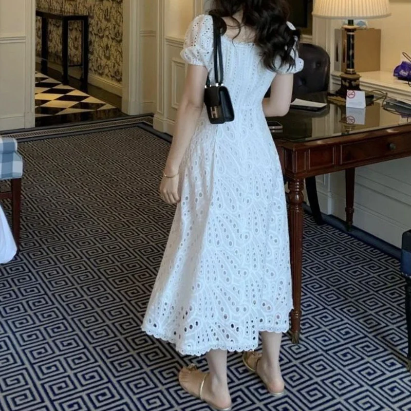 Robe mi-longue blanche évidée pour femme, robe à manches courtes, mode éducative, élégante, coréenne, chic, française, sexy, Kawaii, été