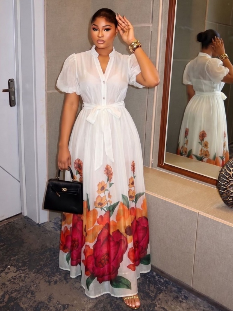 Robe longue maxi bohème à imprimé floral pour femme, collection été 2026, avec manches bouffantes et boutonnage simple, idéale pour les soirées et les vacances