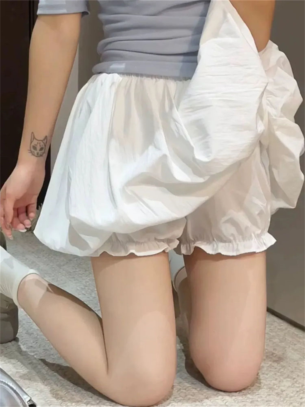 Mini-jupe taille haute coupe trapèze amincissante d'été avec short intégré pour petites tailles, ourlet plissé bouffant pour femme
