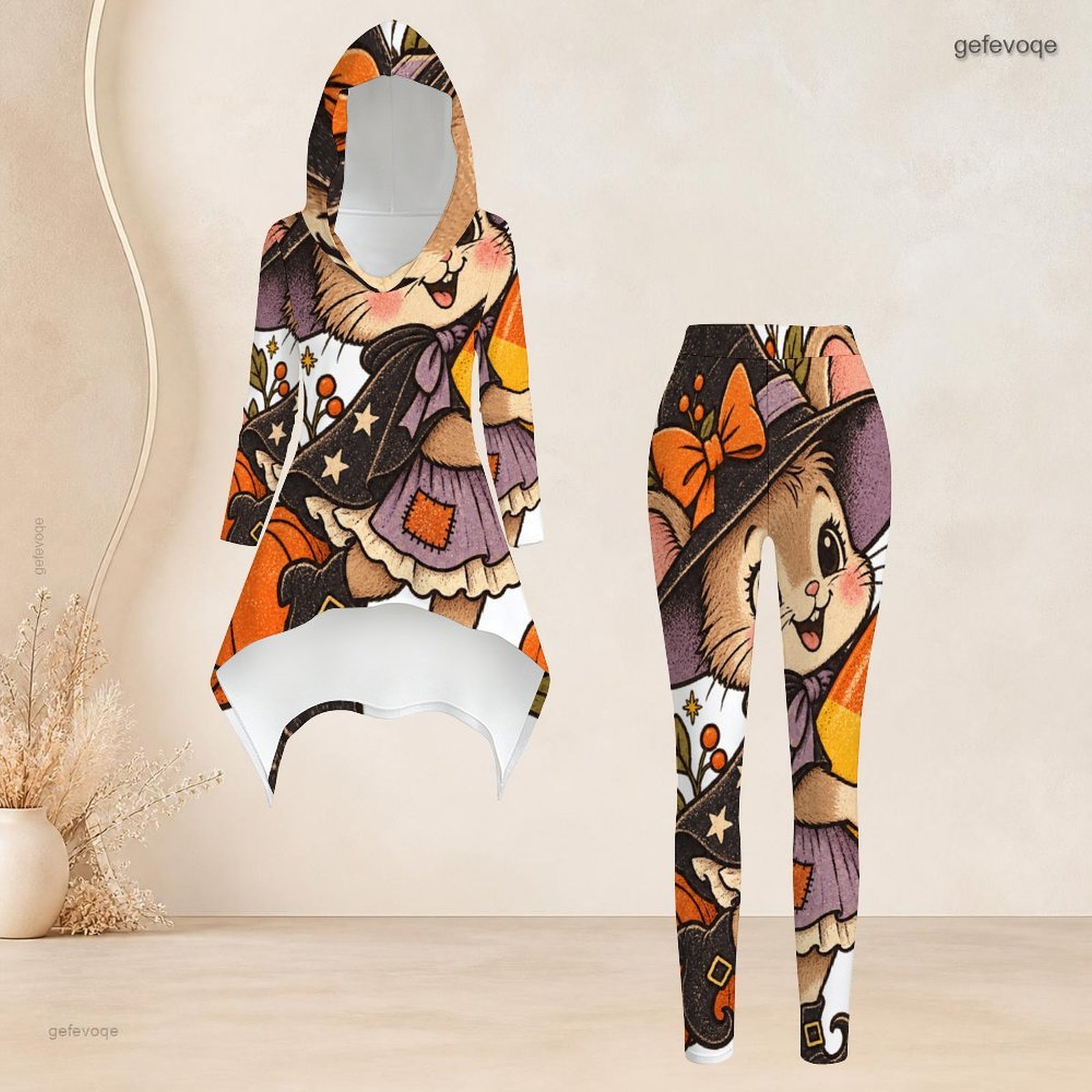 Ensemble décontracté 2 pièces pour femmes : haut tunique asymétrique à capuche et manches longues, et leggings slim taille haute assortis, idéal pour le quotidien.