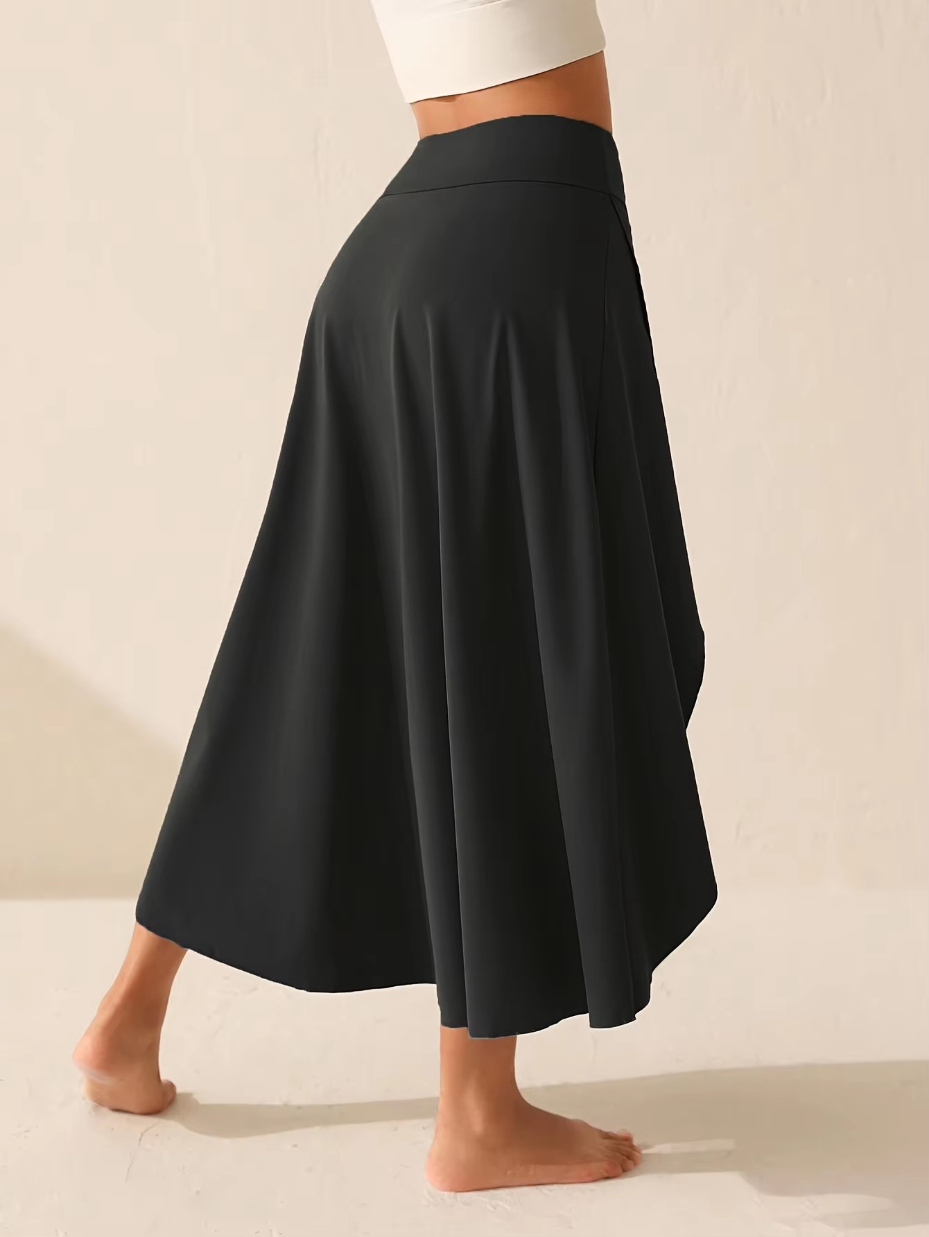 Vêtements féminins européens et américains au style irrégulier, fente élégante, bord à volants, jupe unie