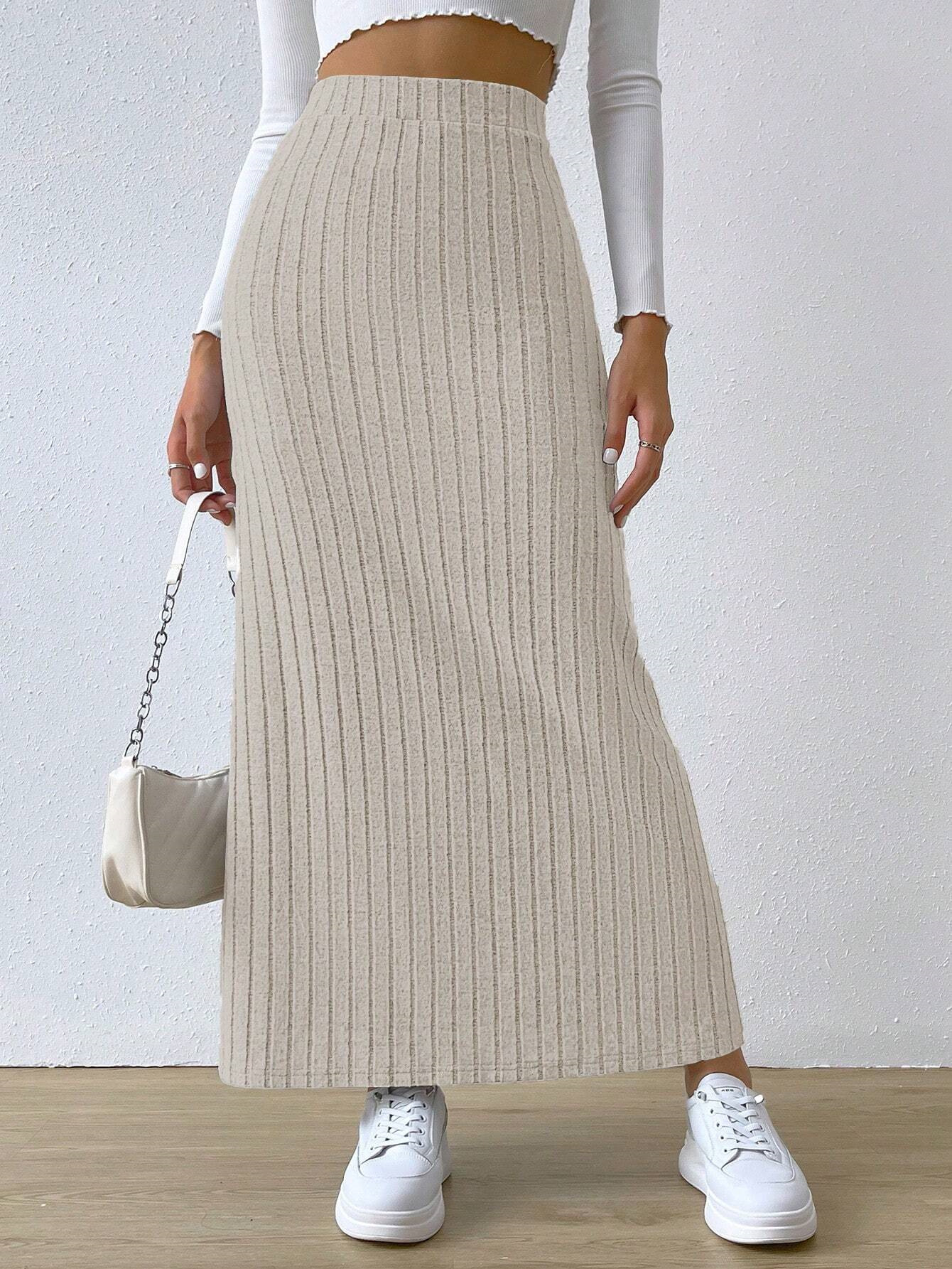 Nouvelle collection Printemps/Été 2026 : Mini-jupe en tricot ajustée, taille haute, fendue sur le côté, pour femme.