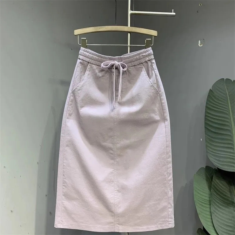 Mode coréenne 2025 nouvelle jupe d'été femmes décontracté sauvage taille haute Simple mi-longue fendue a-ligne jupe mince dames vêtements