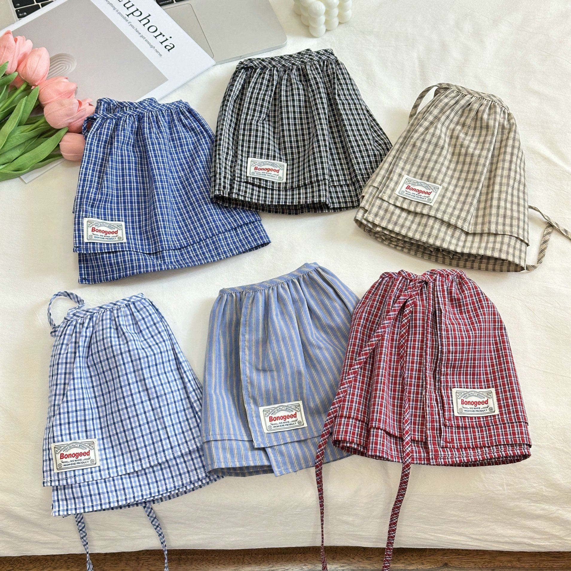 Style coréen 2025 nouvelle mode rétro à lacets Plaid décoratif Double couche pet rideau coton jupe femmes mode jupe