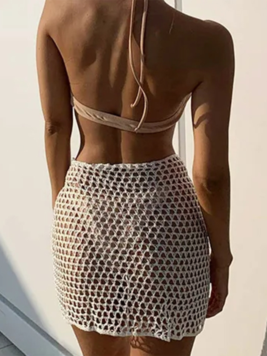Femmes jupe de plage évidé solide noir blanc jaune vert tricoté Mini jupe pour les femmes vacances d'été bord de mer jupe de couverture