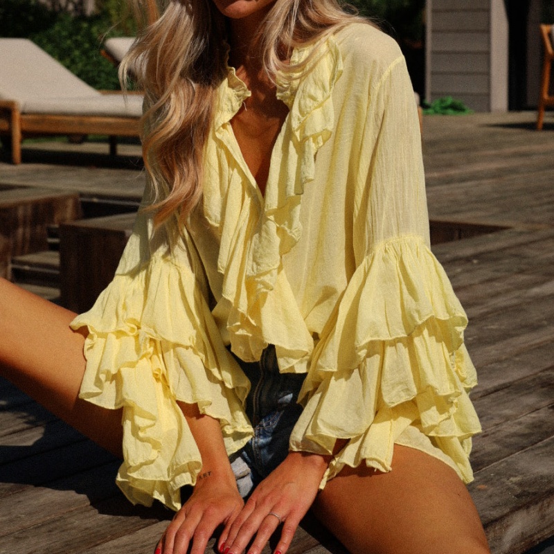 Femmes élégantes couches à volants garniture pure Blouses décontracté coupe ample solide boutonné col en V à manches longues petit haut Streetwear