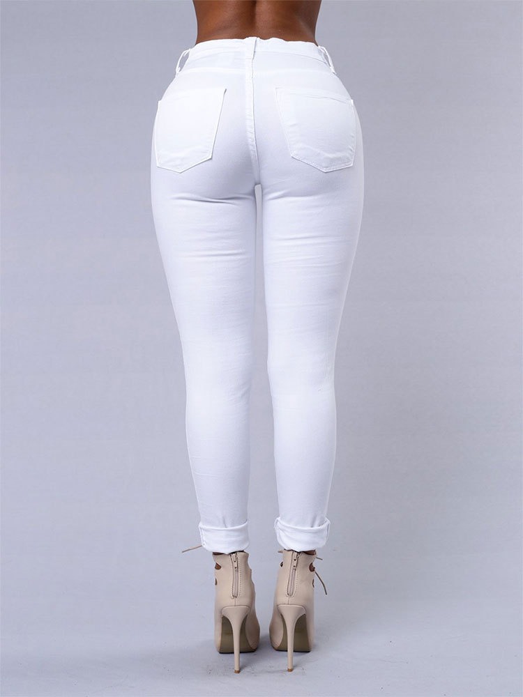 Jean polyvalent de couleur unie pour femmes, pantalon crayon ajouré européen et américain, coupe cintrée minimaliste