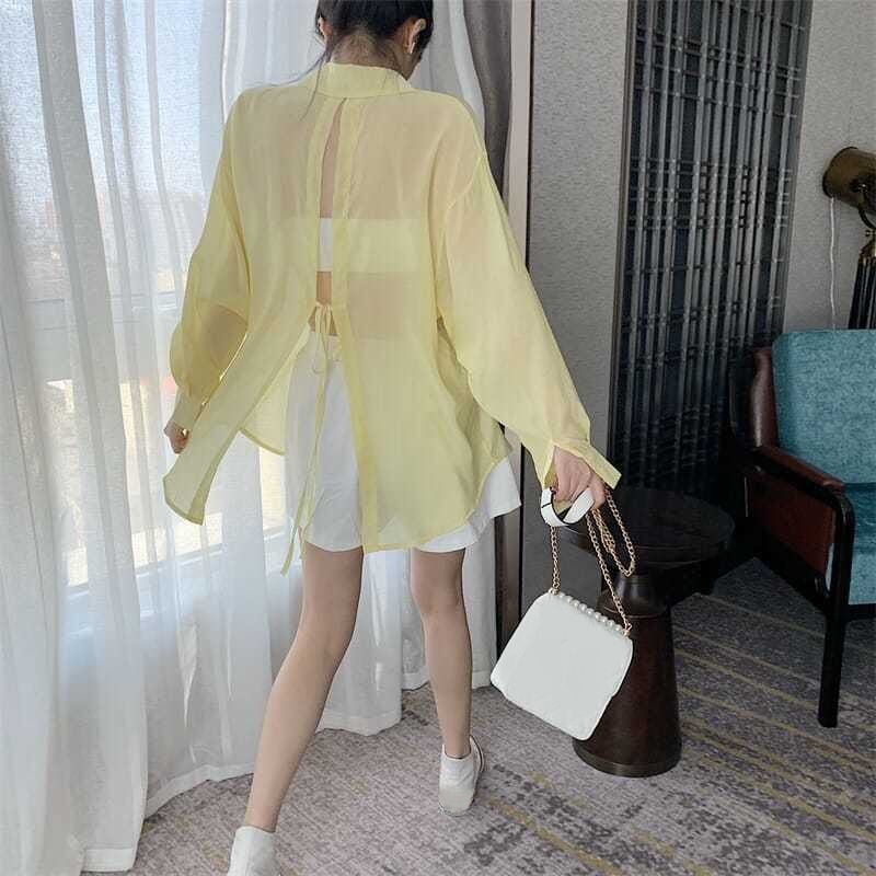 Femmes mode coréenne dos fendu à lacets chemises été mince à manches longues crème solaire chemise femmes décontracté ample vacances plage Blouse