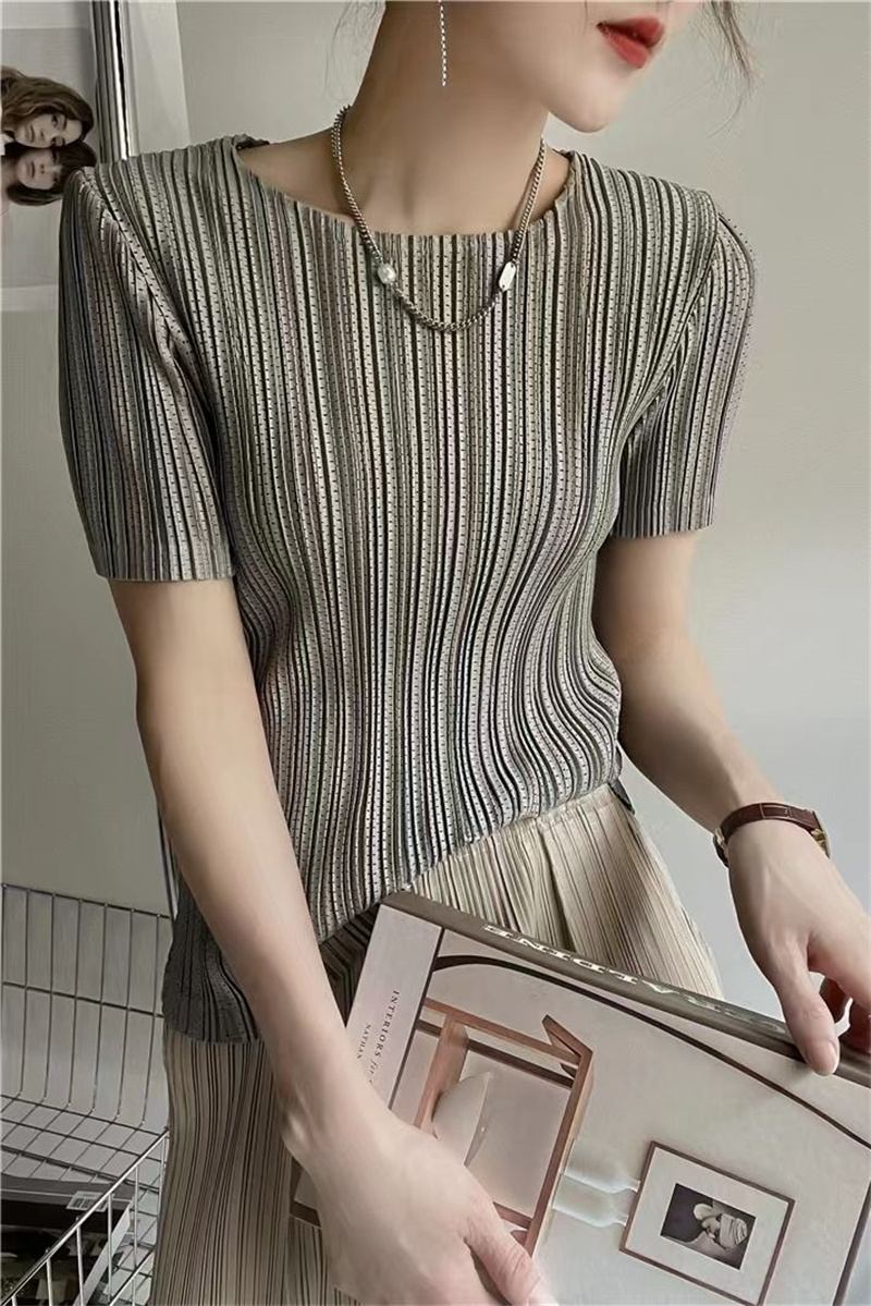 Femme vêtements haut femmes Miyake plissé à manches courtes femme été mince élastique col rond Joker mince plissé creux T-shirt