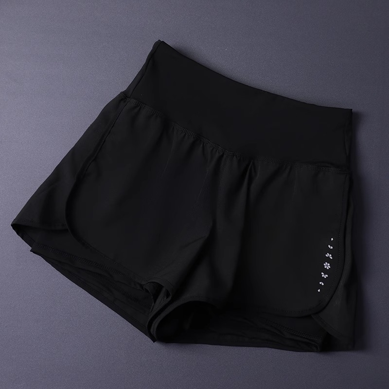 Short 2 en 1 pour femme avec poches – Léger, respirant, ample, anti-exposition, côté fendu pour le yoga, la course à pied, la salle de sport