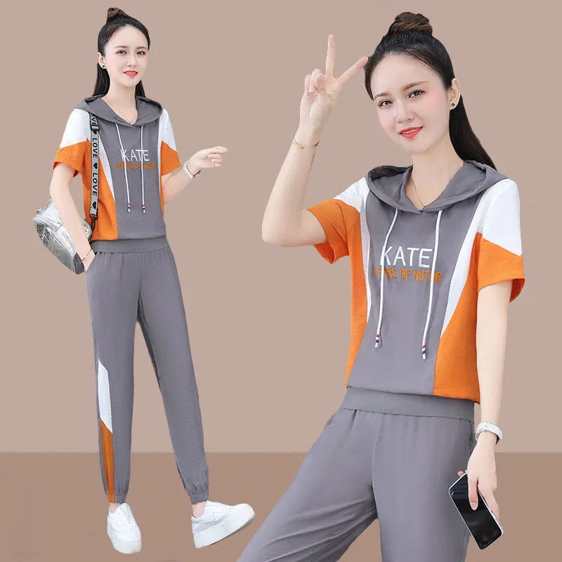 Survêtement de mode pour femmes 2025 printemps été nouveau ensemble deux pièces à capuche manches courtes haut court et pantalon coréen grande taille vêtements