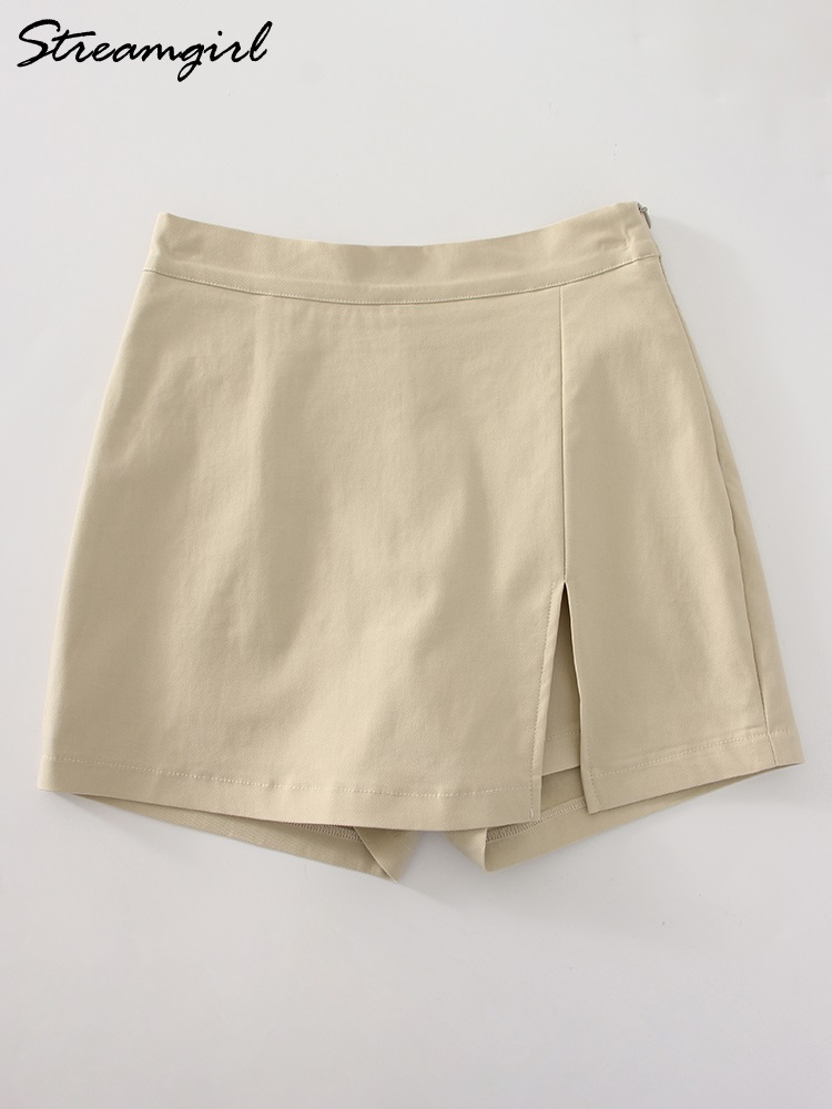 Mini jupe divisée d'été pour femmes jupes élastiques noir bureau dame fente jupes courtes taille haute femmes Mini jupe Shorts fermeture éclair