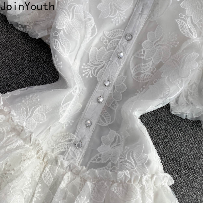 Robe d'été en dentelle blanche pour femmes, tunique de tempérament, manches bouffantes, broderie, à la mode, 2025