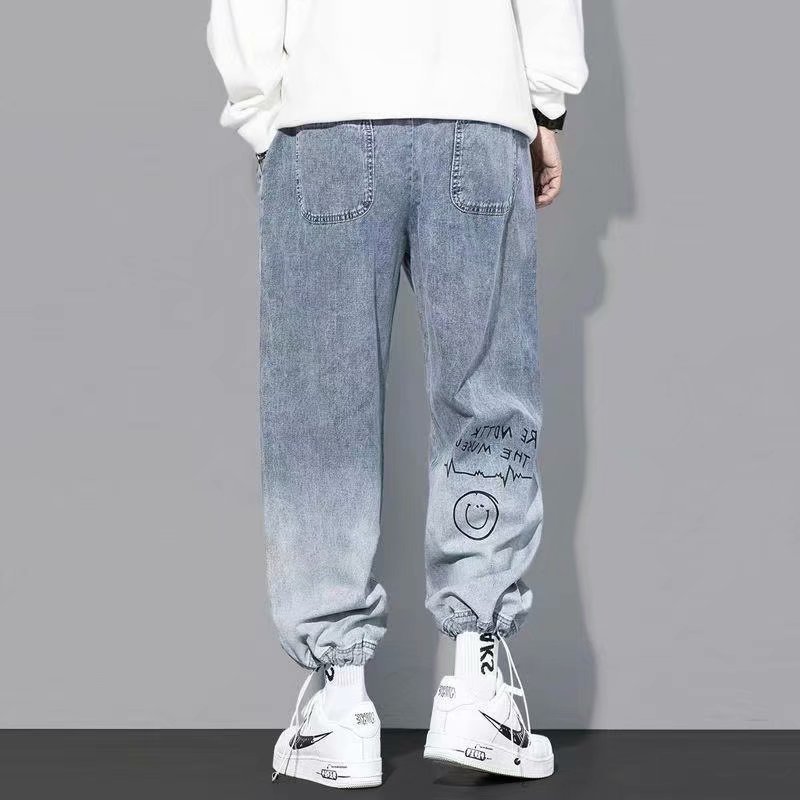 Vêtements coréens hommes lettre imprimé jean taille haute Baggy jean dessin animé Graffiti Hip-Hop pantalon jean bleu