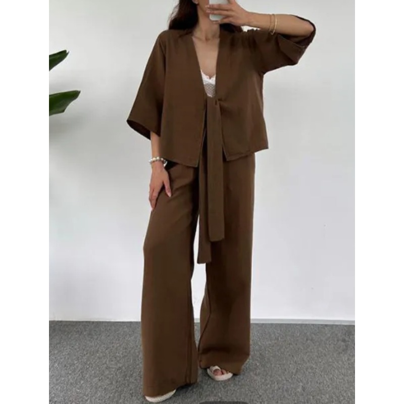 Nouvelle tenue élégante pour femme : costume à col en V qui affine la taille et met en valeur les courbes