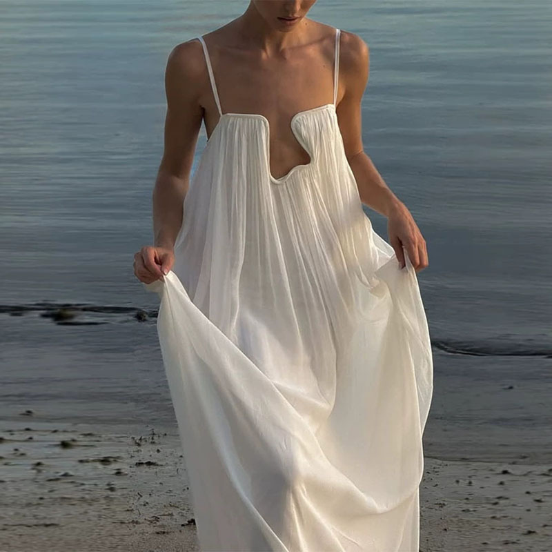 Robes pour femmes Printemps 2026, Robe longue maxi de soirée style bohème, col en U, avec décorations métalliques, ajourée, dos nu, unie, ample, à bretelles, pour l'été, Vestido