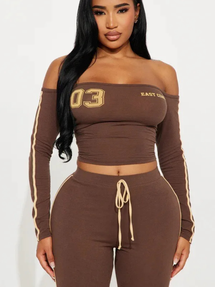 Hot girl fashion tendance costume longueur latérale irrégulière pantalon à manches longues hors épaule vêtements pour femmes printemps et été