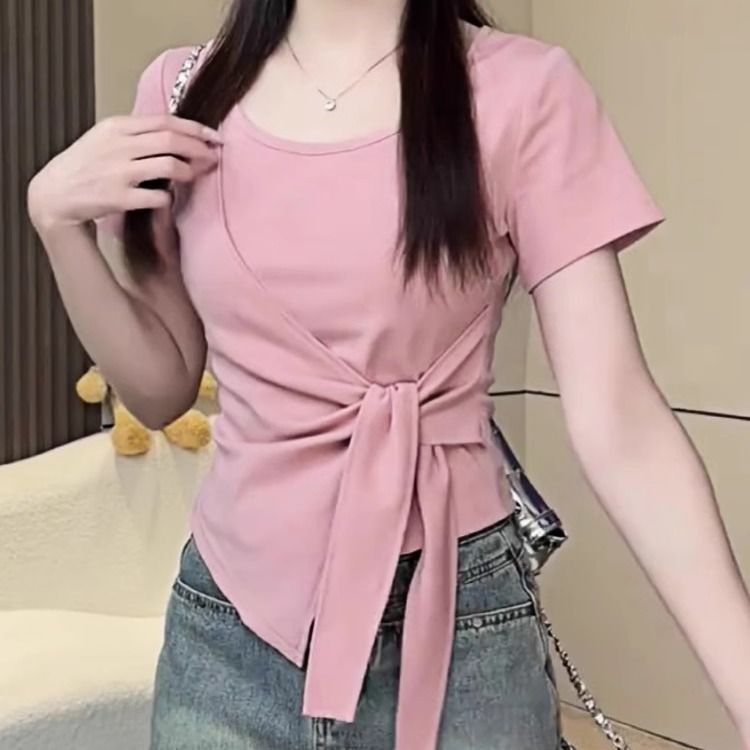 Nouveau T-shirt d'été pour femme, couleur unie, style décontracté, coupe ajustée, à manches courtes, avec fente latérale et taille à lanière, asymétrique