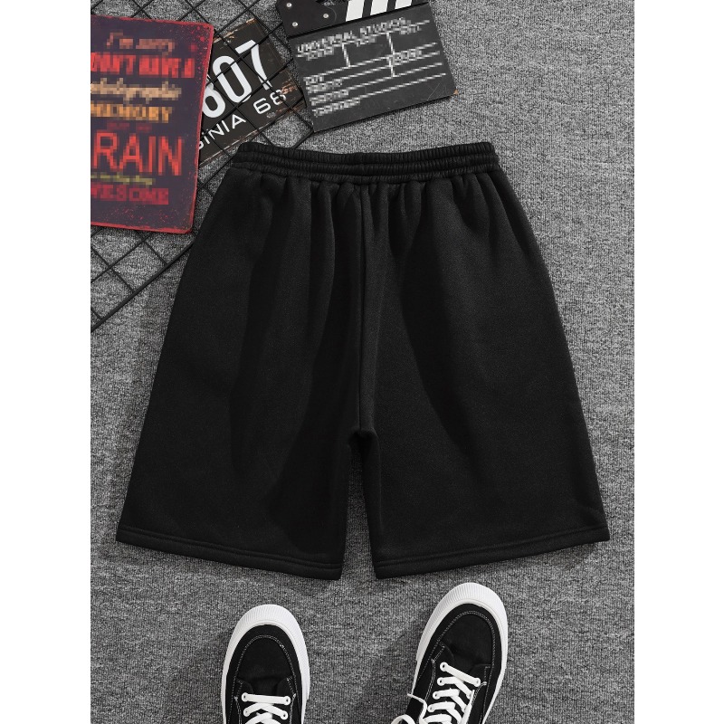 Shorts décontractés pour hommes, noir et blanc, tendance et polyvalents, style sportif. Nouveaux shorts d'été adaptés aux hommes et aux femmes