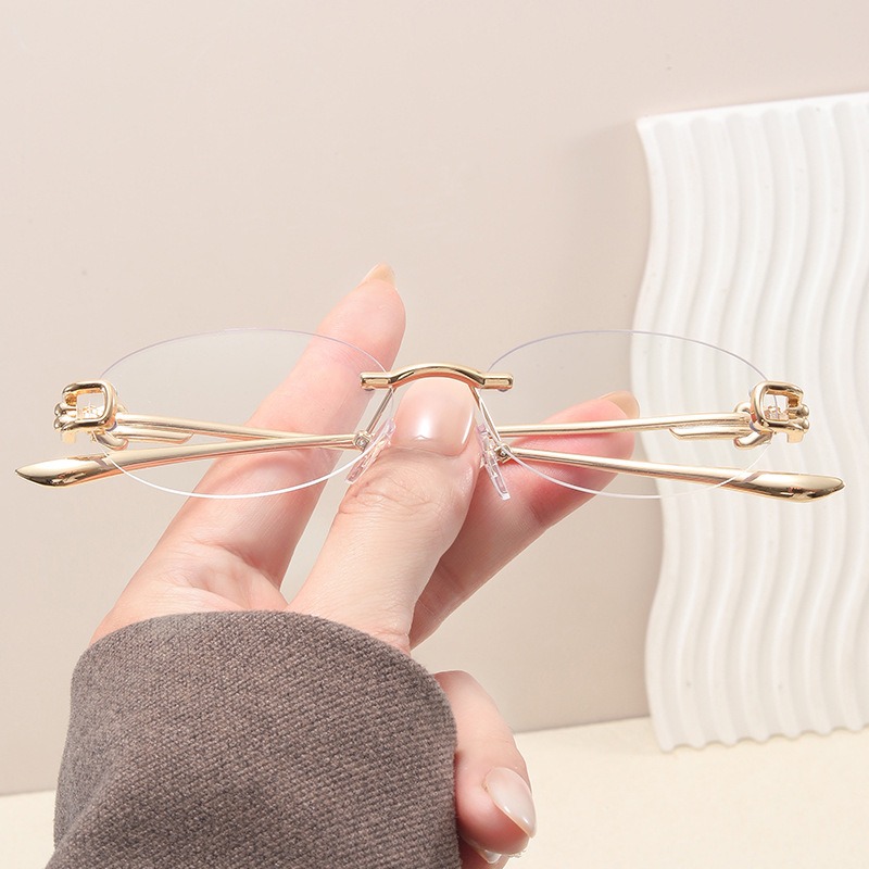 Lunettes de soleil ovales élégantes pour femmes, sans monture, décontractées, avec monture métallique, verres anti-lumière bleue, protection UV400, style urbain avancé